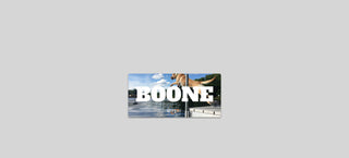 A custom nameplate featuring the name BOONE and a scenic background, demonstrating personalization options for the Custom Nameplate.