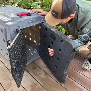 Putting a kennel divider into a RuffLand® Kennel