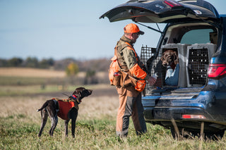 Hunter with two dogs and Ruff Land Kennels in Millstone in trunk