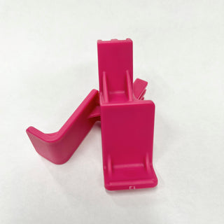 Isolated photo of Click's Easy Squeeze in hot pink.