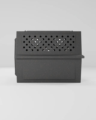 Side view of the RuffLand® 500 Series XL Airline Dog Kennel emphasizing its compact structure and ventilation holes for pet comfort.
